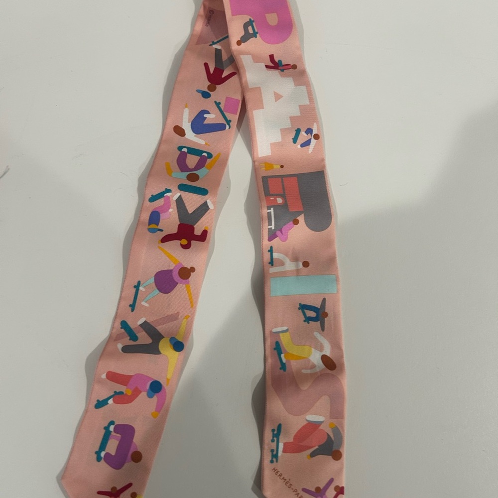 Hermes’ silk Twilly with Playful Design